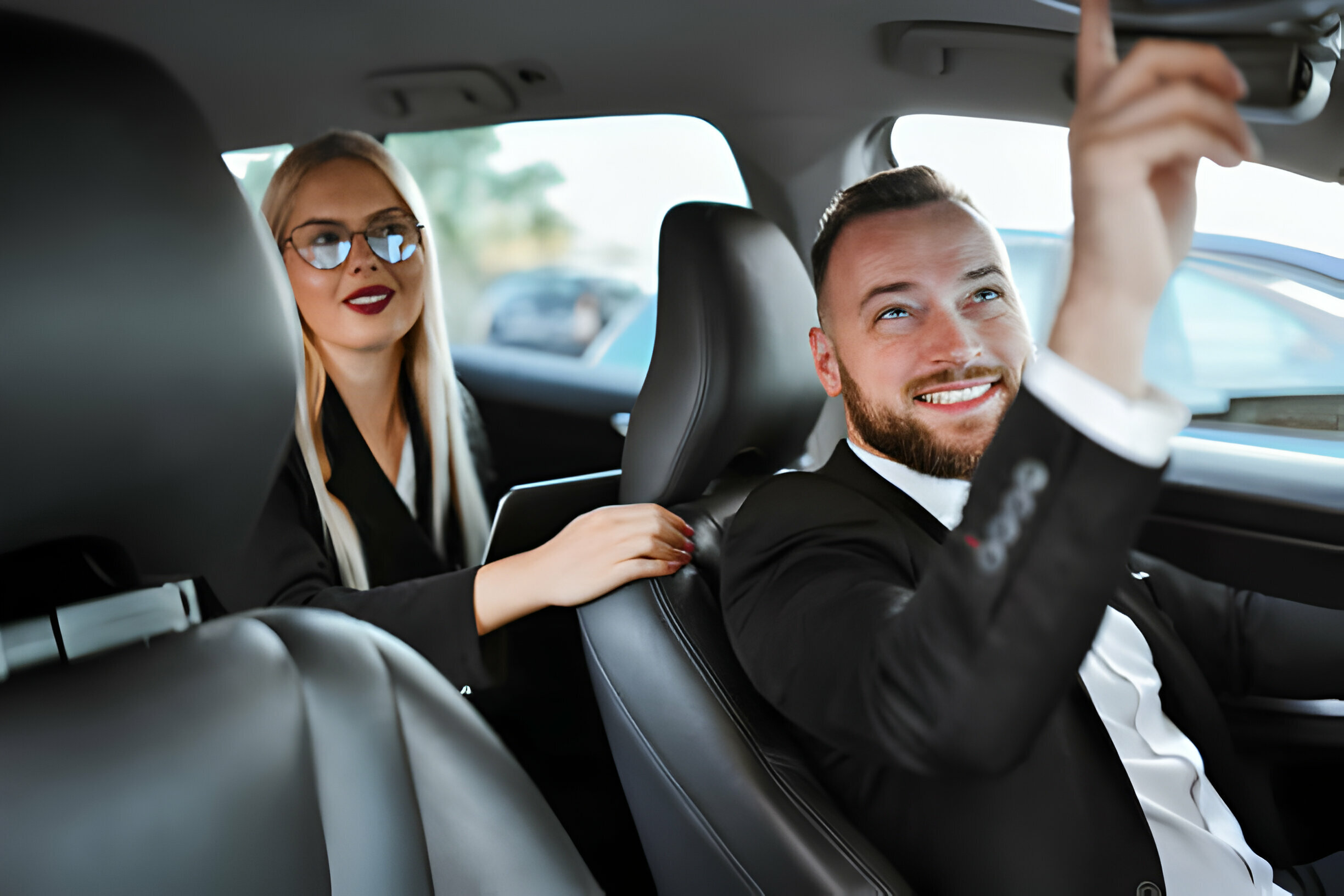 Professional private chauffeur inside a premium vehicle